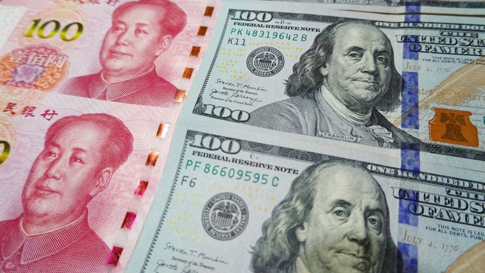 yuan and dollar