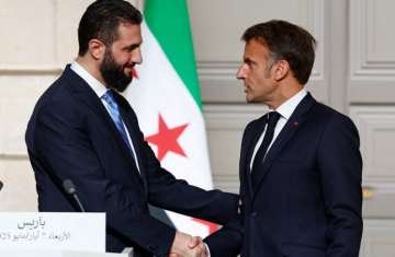 الرئيس الفرنسي ونظيره السوري