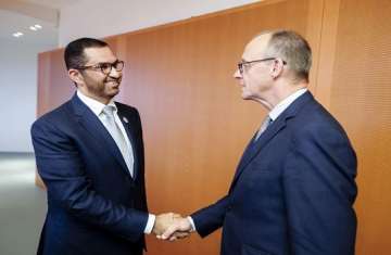 مستشار ألمانيا والوزير الإماراتي