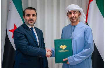 وزيرا خارجية الإمارات وسوريا