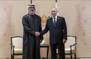 فلاديمير بوتين والشيخ خالد بن محمد بن زايد