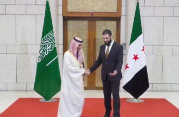 أحمد الشرع وفيصل بن فرحان