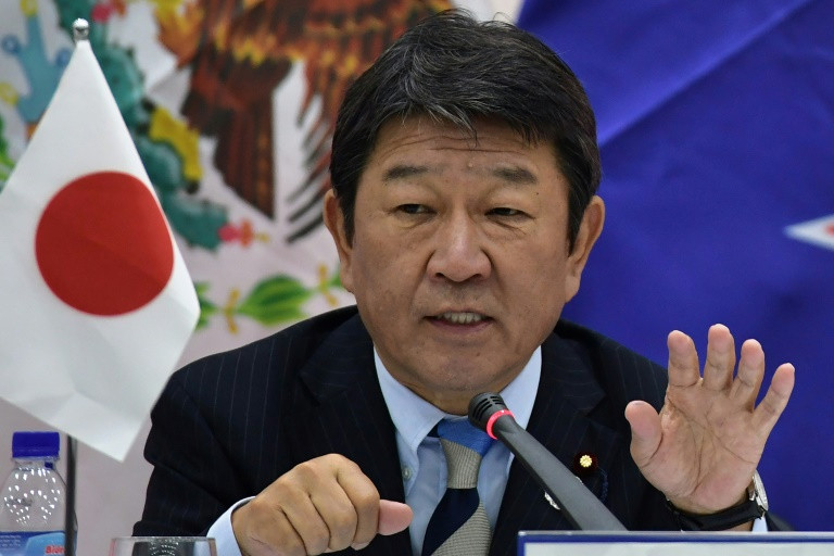 وزير الاقتصاد الياباني توشيميتسو موتيجي