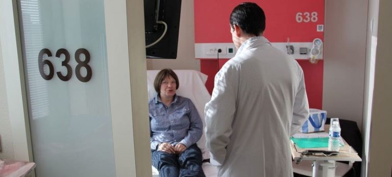 An oncologist consults with a cancer patient at a hospital in Lyon, France. Photo: WHO