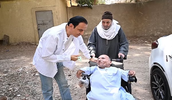 الحج سعيد والإعلامي طارق علام