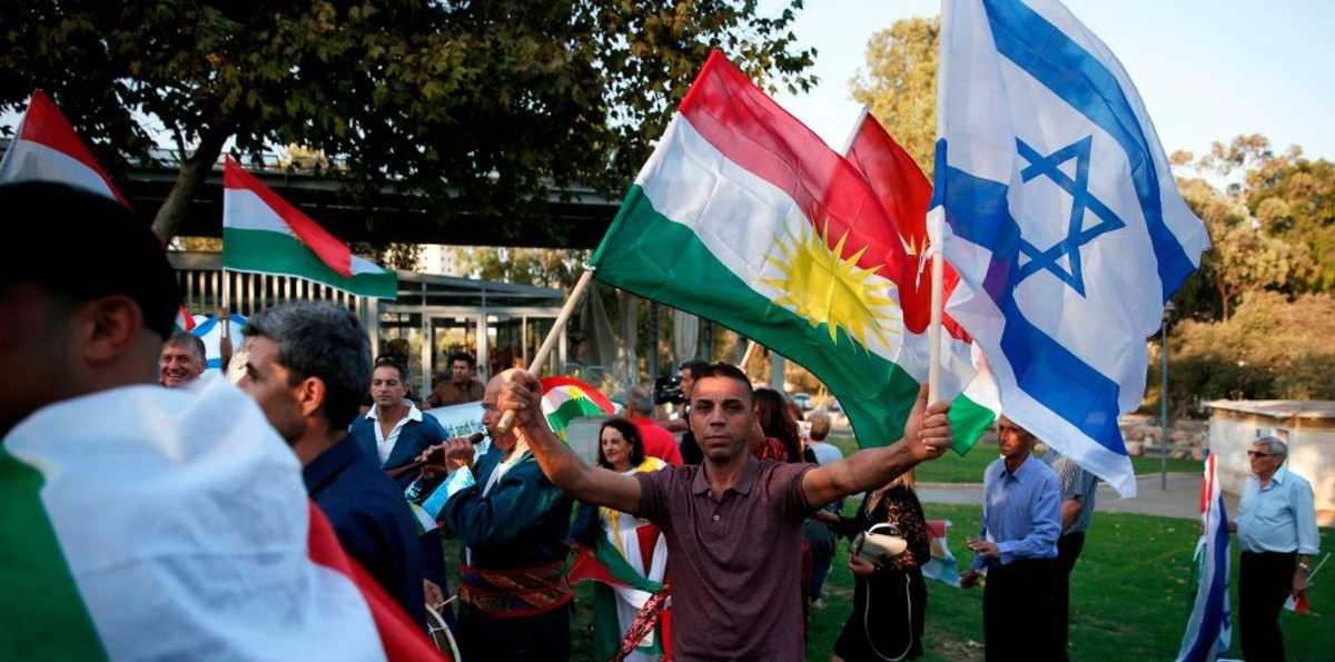 المتظاهرون الأكراد رفعوا أعلام إسرائيل