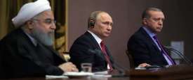 رجب طيب أردوغان وفلاديمير بوتين وحسن روحاني