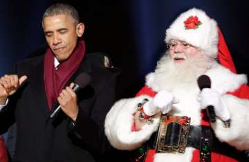 أوباما يغنى مع بابا نويل أثناء فترة رئاسته 