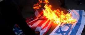 حرق علم الاحتلال والأمريكي - أرشيفية 