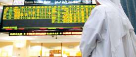 متعاملون أثناء التداول في البورصة 
