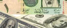 الريال السعودي والدولار الأمريكي