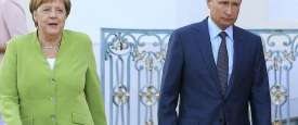 بوتين وميركل