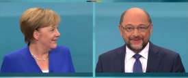 إنجيلا ميركل ومارتن شولتز خلال مناظرة بينهما مساء أمس في برلين- صورة من التليفزيون الألماني
